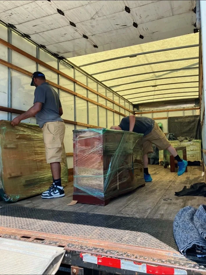 Wrapped furniture being loaded